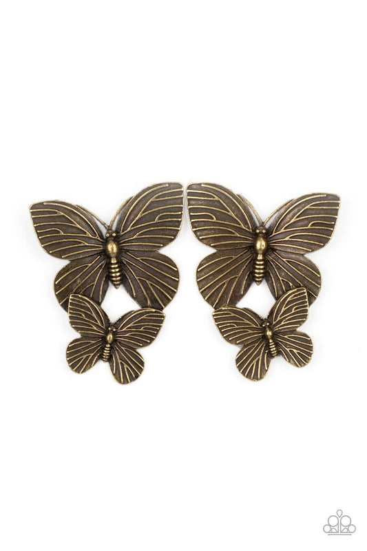 Paparazzi Accessories Blushing Butterflies - Brass Veined with lifelike textures, a pair of rustic brass butterflies flutters from the ear for a whimsical fashion. Earring attaches to a standard post fitting. Sold as one pair of post earrings. Jewelry