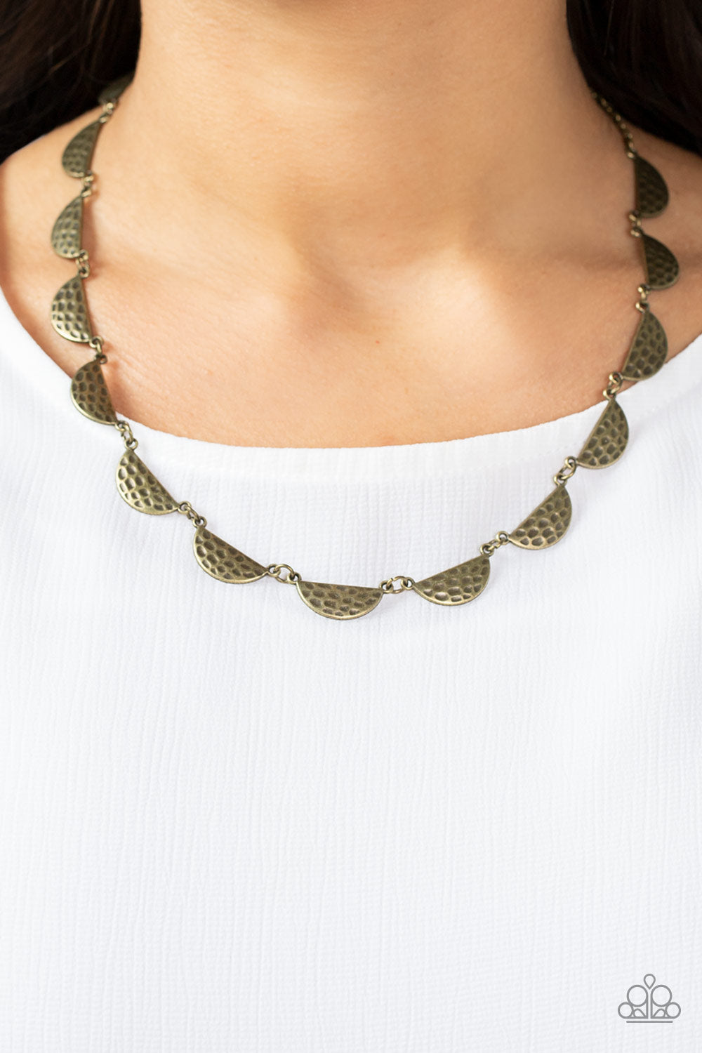 Paparazzi Accessories Lunar Jungle - Brass A celestial display of hammered half-moon brass discs link together for a cosmic charm below the collar. Features an adjustable clasp closure. Sold as one individual necklace. Includes one pair of matching earrin