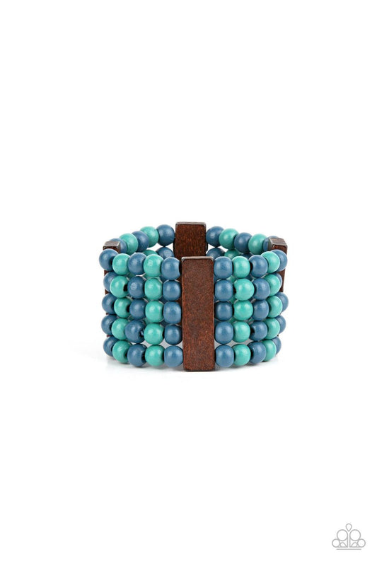 Paparazzi Accessories Island Soul - Blue Colorful layers of blue and turquoise wooden beads are threaded along stretchy bands between dark brown wooden bars creating stacks of subtle bliss around the wrist. Sold as one individual bracelet. Jewelry