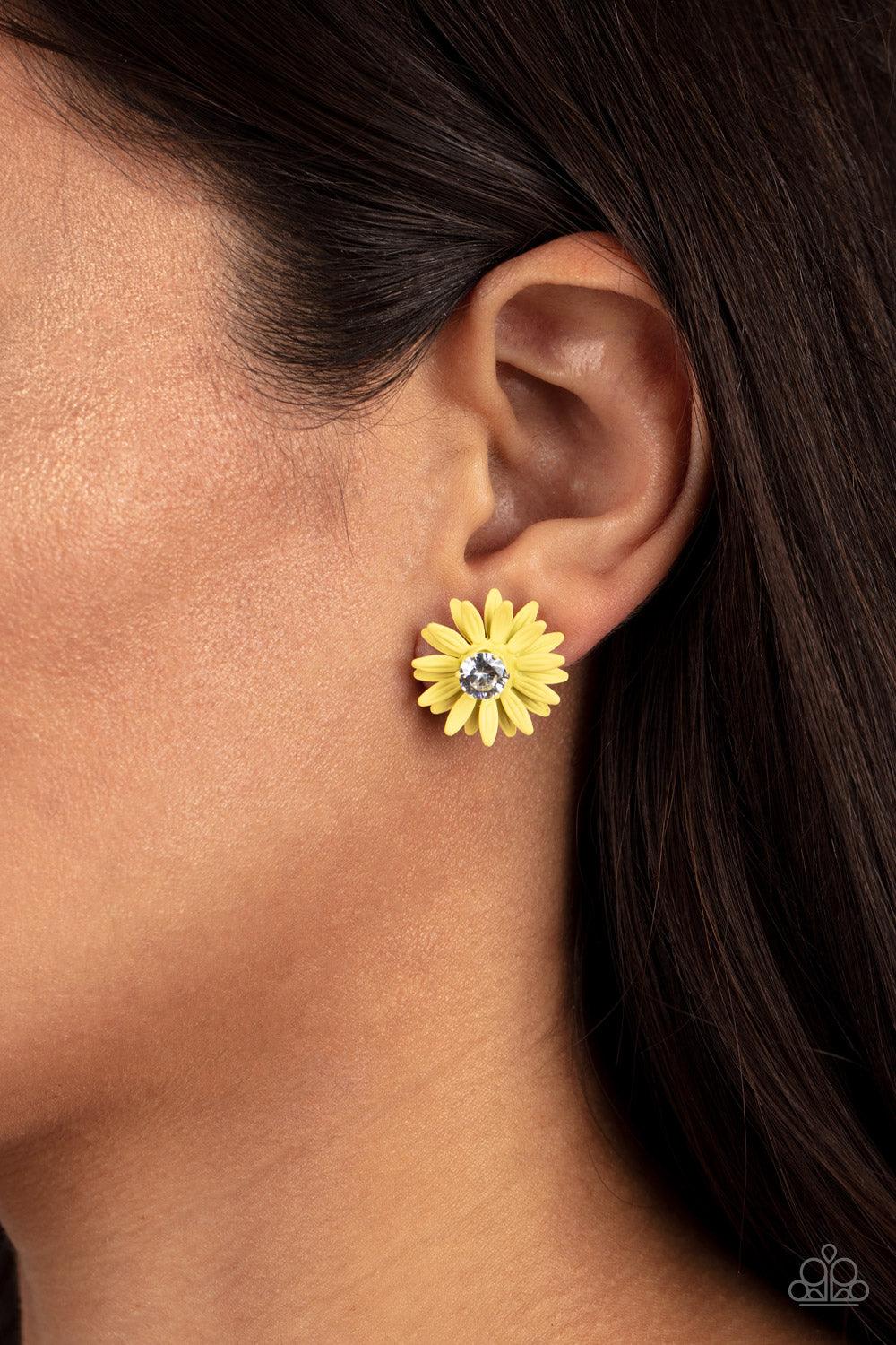 Paparazzi Accessories Sunshiny DAIS-y - Yellow Layers of yellow petals fan out from an oversized white rhinestone fitting, blooming into a sparkly floral centerpiece. Earring attaches to a standard post fitting. Sold as one pair of post earrings. Earrings