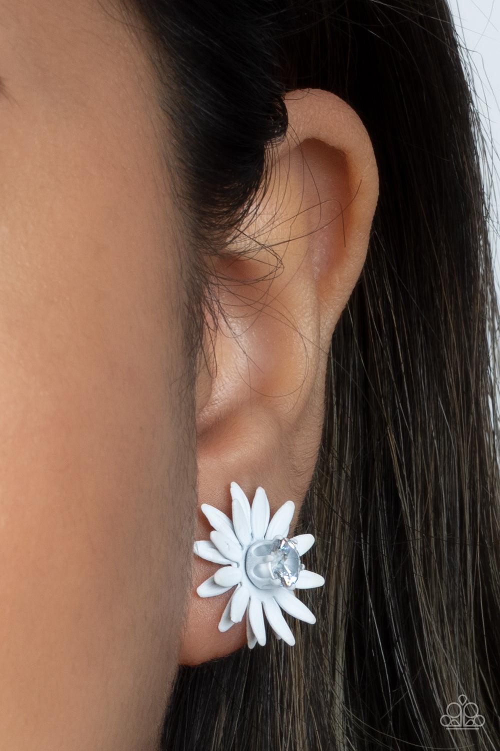 Paparazzi Accessories Sunshiny DAIS-y - White Layers of white petals fan out from an oversized white rhinestone fitting, blooming into a sparkly floral centerpiece. Earring attaches to a standard post fitting. Sold as one pair of post earrings. Earrings
