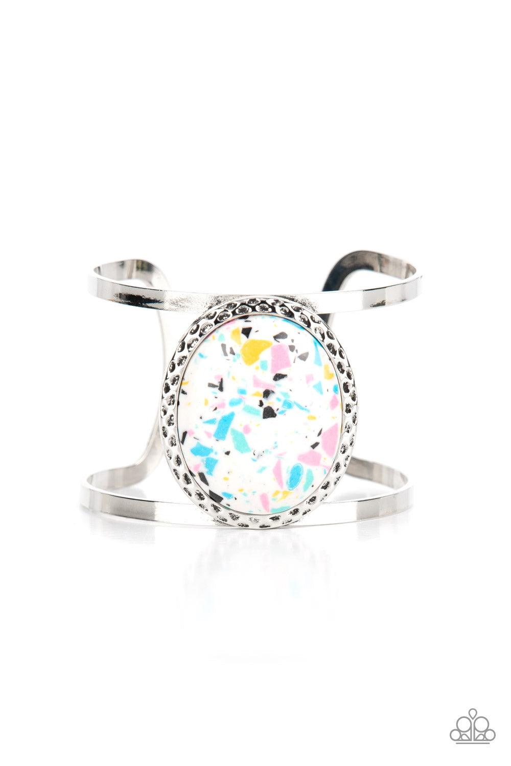 Paparazzi Accessories Tantalizingly Terrazzo - Multi Featuring a colorful terrazzo finish, an oversized multi-colored stone is pressed into the center of a hammered silver frame atop a layered silver cuff for a modern stone look. Sold as one individual br