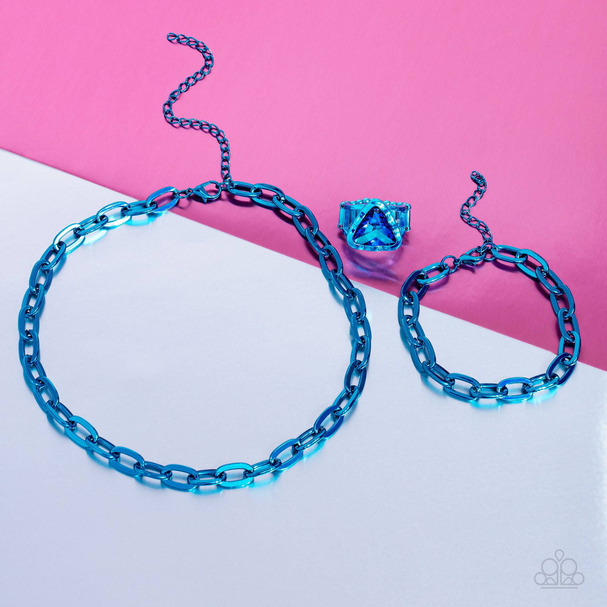 Paparazzi Accessories Exuberant Encore - Blue Oversized electric blue links connect below the collar for a bold urban look. Features an adjustable clasp closure. Sold as one individual choker necklace. Includes one pair of matching earrings. Get The Compl