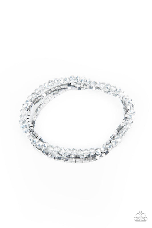 Paparazzi Accessories Just a Spritz - Silver Two rows of dainty silver cube beads and one row of smoky crystal-like beads are threaded along stretchy bands around the wrist, creating stellar layers. Sold as one set of three bracelets. Jewelry
