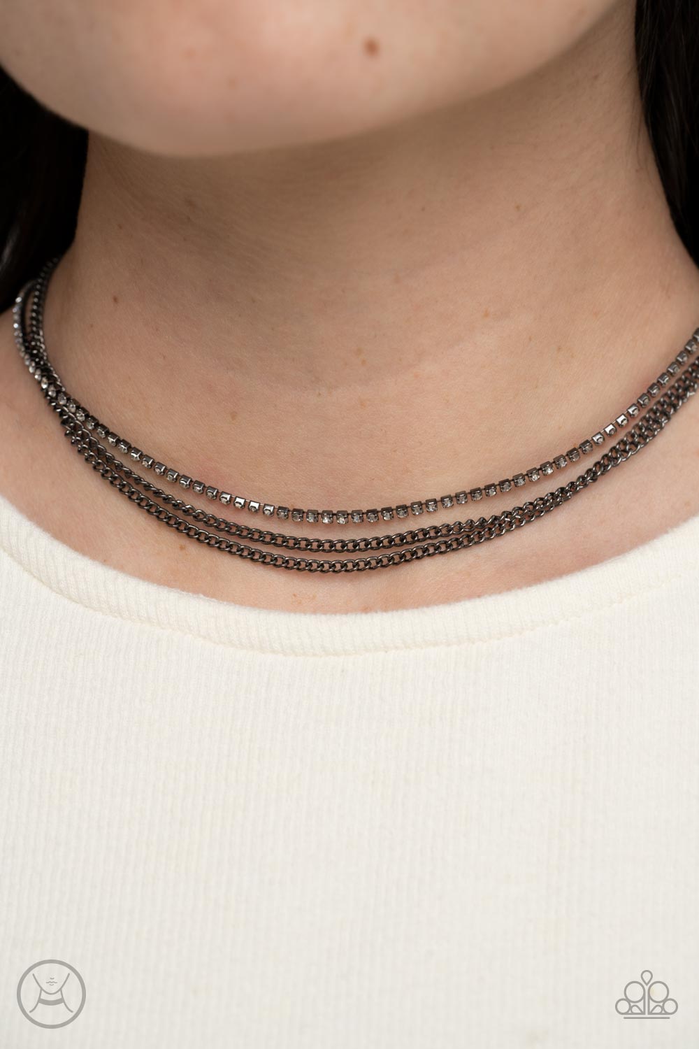 Paparazzi Accessories Glitzy Gusto - Black Two glistening gunmetal chains and a single strand of dainty white rhinestones effortlessly layer around the neck, resulting in a radiant look. Features an adjustable clasp closure. Sold as one individual choker