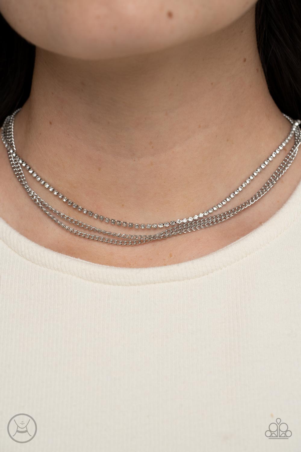 Paparazzi Accessories Glitzy Gusto - White Two glistening silver chains and a single strand of dainty white rhinestones effortlessly layer around the neck, resulting in a radiant look. Features an adjustable clasp closure. Sold as one individual choker ne