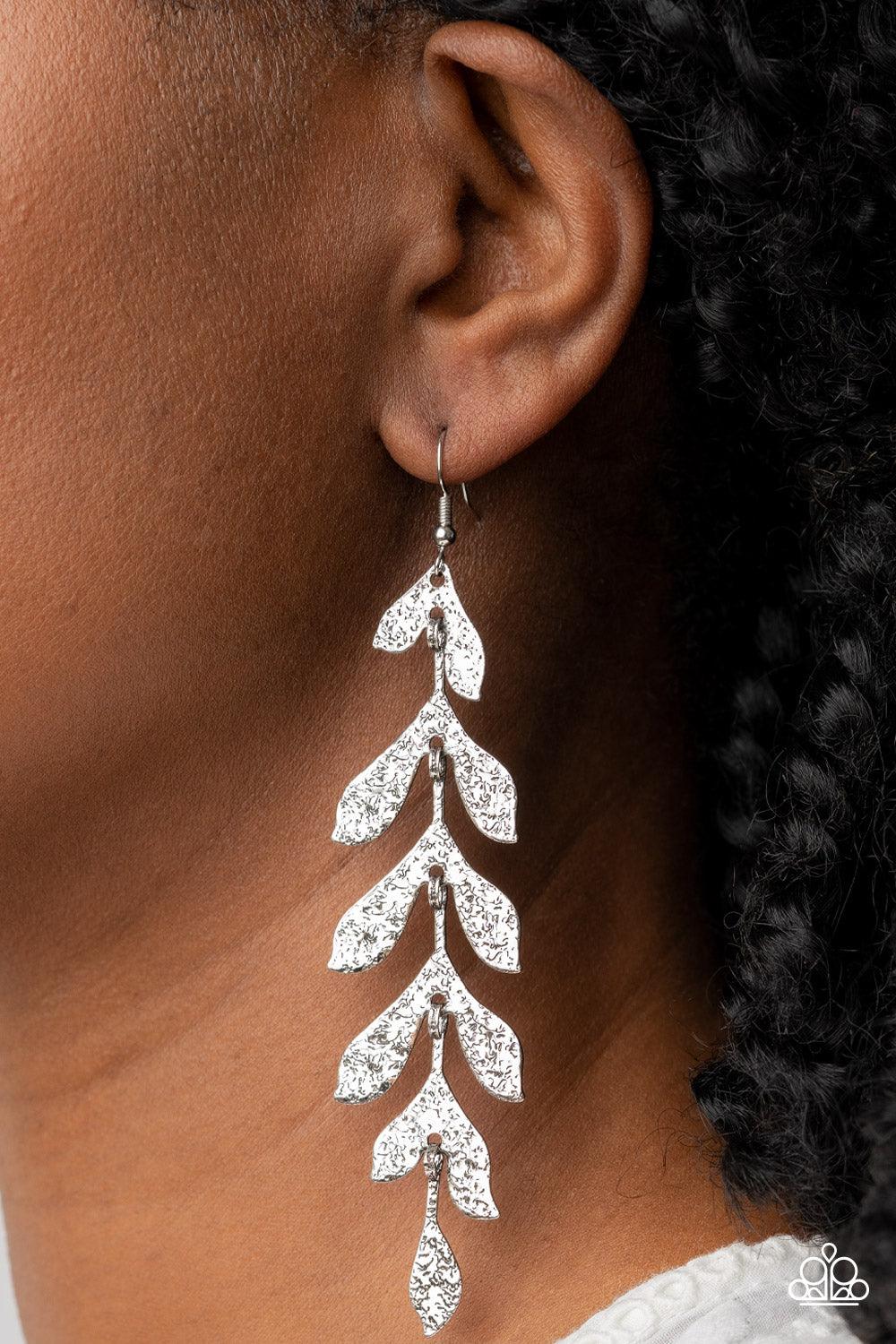 Paparazzi Accessories Lead From the FROND - Silver Hammered in a rustic finish, antiqued silver frames delicately link into a leafy lure for a seasonal inspired style. Earring attaches to a standard fishhook fitting. Sold as one pair of earrings. Earrings