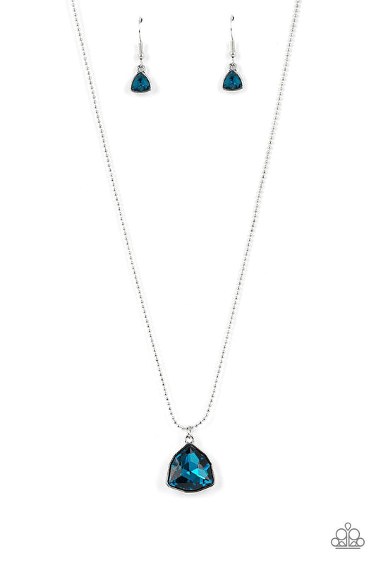 Paparazzi Accessories Galactic Duchess - Blue A faceted asymmetrical blue gem is encased in a sleek silver frame at the bottom of a silver popcorn chain, creating a stellar pendant below the collar. Features an adjustable clasp closure. Sold as one indivi