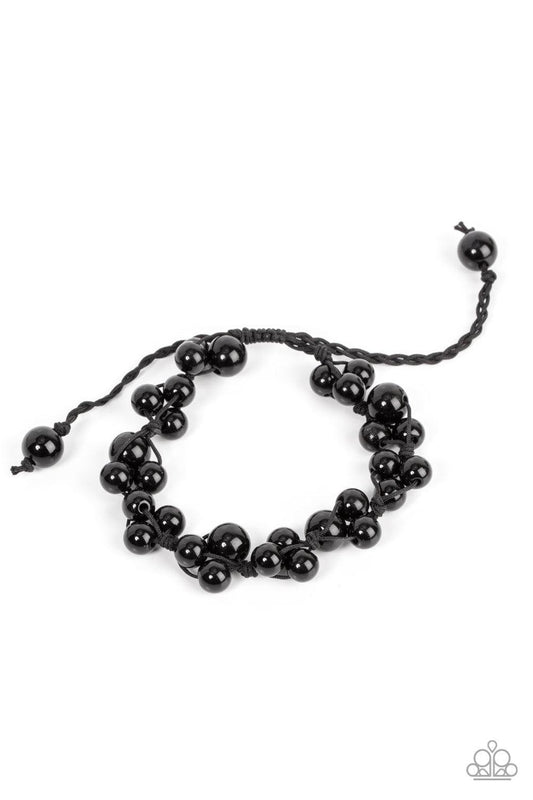 Paparazzi Accessories Vintage Versatility - Black Bubbly clusters of black beads are decoratively knotted around the wrist, adding a timeless twist to the classic centerpiece. Features an adjustable sliding knot closure. Sold as one individual bracelet. J