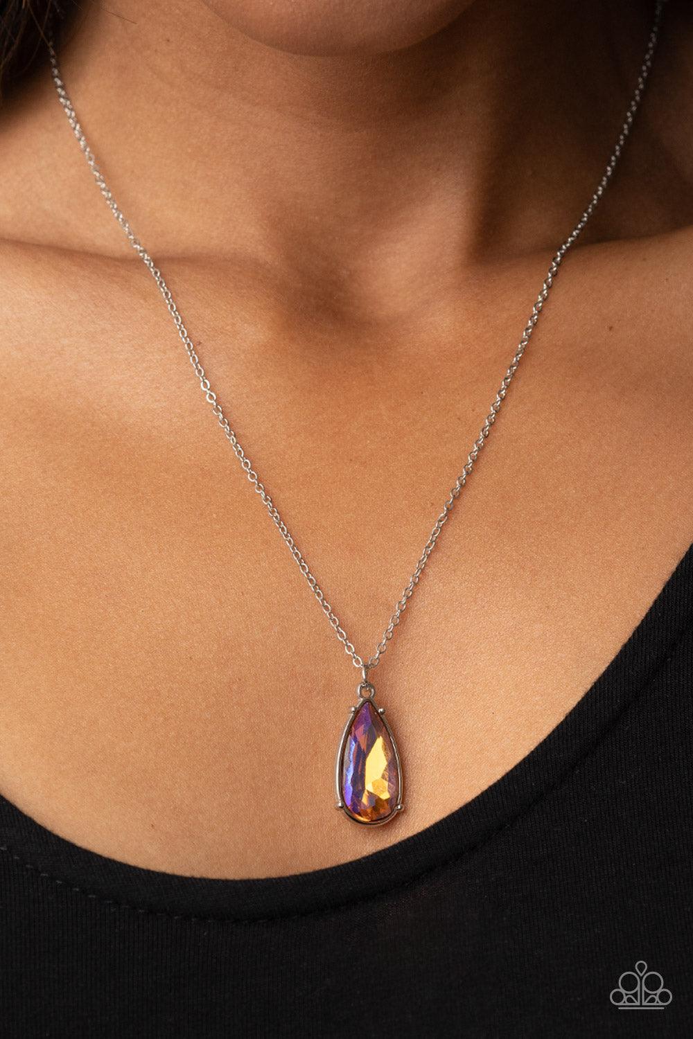 Paparazzi Accessories Interstellar Royal - Multi Encased in a shiny silver fitting, an iridescent teardrop gem glides along a dainty silver chain below the collar for a stellar fashion. Features an adjustable clasp closure. Sold as one individual necklace