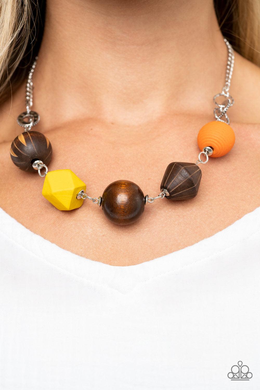 Paparazzi Accessories Eco Extravaganza - Multi Infused with yellow and orange wooden beads, a mismatched assortment of studded silver hoops, textured silver rings, and oversized brown wooden beads delicately connect across the chest for a stylishly handcr