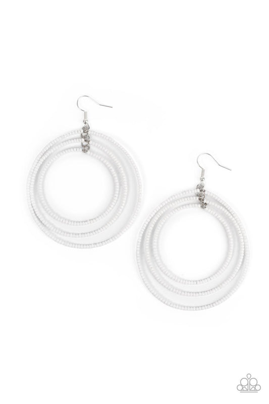 Paparazzi Accessories Colorfully Circulating - White Three oversized rings of dainty white seed beads ripple into colorfully layered hoops, resulting in a dizzying display. Earring attaches to a standard fishhook fitting. Sold as one pair of earrings. Ear