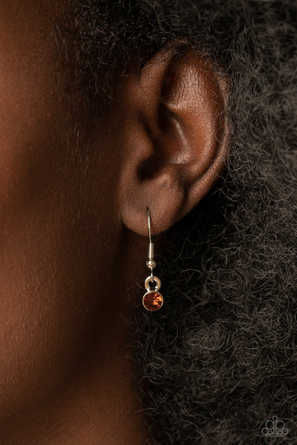 Paparazzi Accessories Holly Heiress - Brown A textured collection of silver holly-like leaves are dotted with dainty topaz rhinestones as they bloom below the collar, invoking a festive spirit. Features an adjustable clasp closure. Sold as one individual
