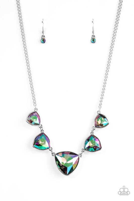Paparazzi Accessories Cosmic Constellations - Multi Encased in sleek silver fittings, an oversized collection of UV geometric gems gradually increase in size as they link below the collar for a stellar statement. Features an adjustable clasp closure. Due