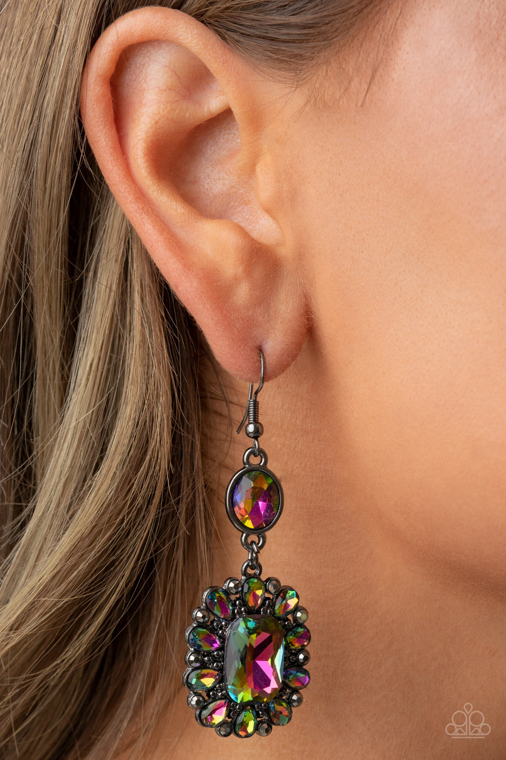 Paparazzi Accessories Capriciously Cosmopolitan - Multi Dainty hematite rhinestones and teardrop oil spill gems fan out from an oversized oil spill emerald cut gem at the bottom of a solitaire oval oil spill gem, resulting in a glamorously glitzy lure. Ea