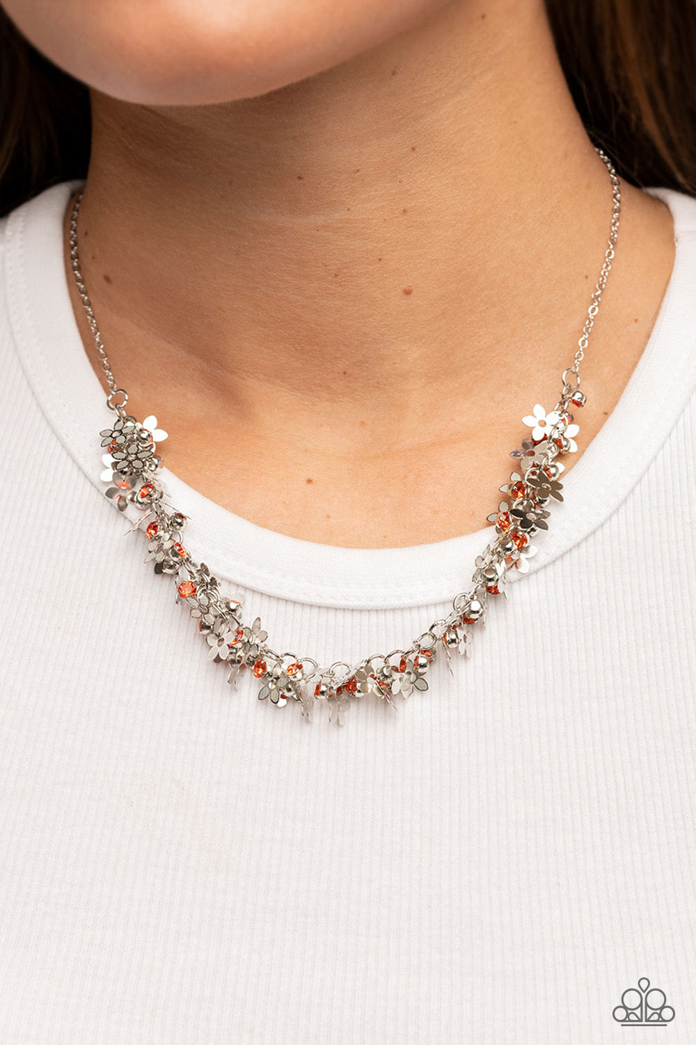 Paparazzi Accessories Fearlessly Floral - Orange Featuring textured petals, a dainty collection of silver flower frames and glassy orange rhinestones delicately cluster along the bottom of a silver chain for a flirtatious floral look below the collar. Fea