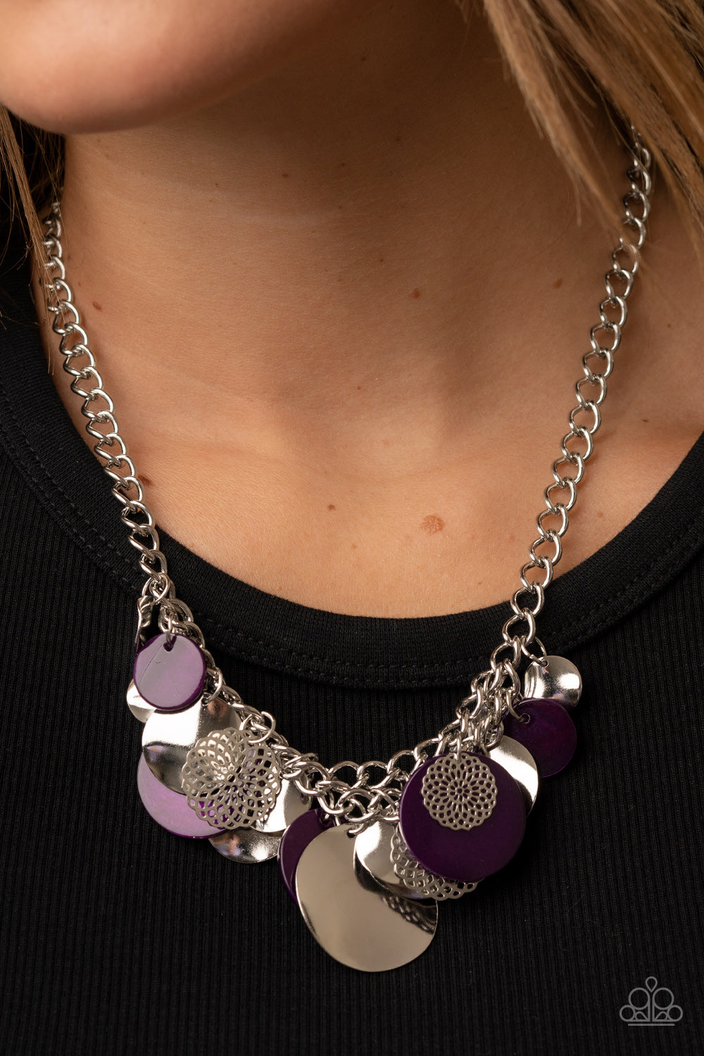 Paparazzi Accessories Oceanic Opera - Purple A summery collection of bent silver discs, plum shell-like discs, and silver mandala-like accents cascades from a pair of layered silver chains, resulting in a bubbly and boisterous fringe below the collar. Fea