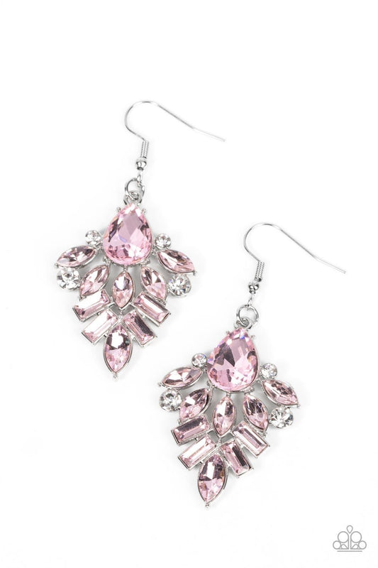 Paparazzi Accessories Stellar-escent Elegance - Pink Dainty white rhinestones are sprinkled between a stunning stack of emerald, teardrop, and marquise cut pink rhinestones, resulting in a lavish lure. Earring attaches to a standard fishhook fitting. Sold