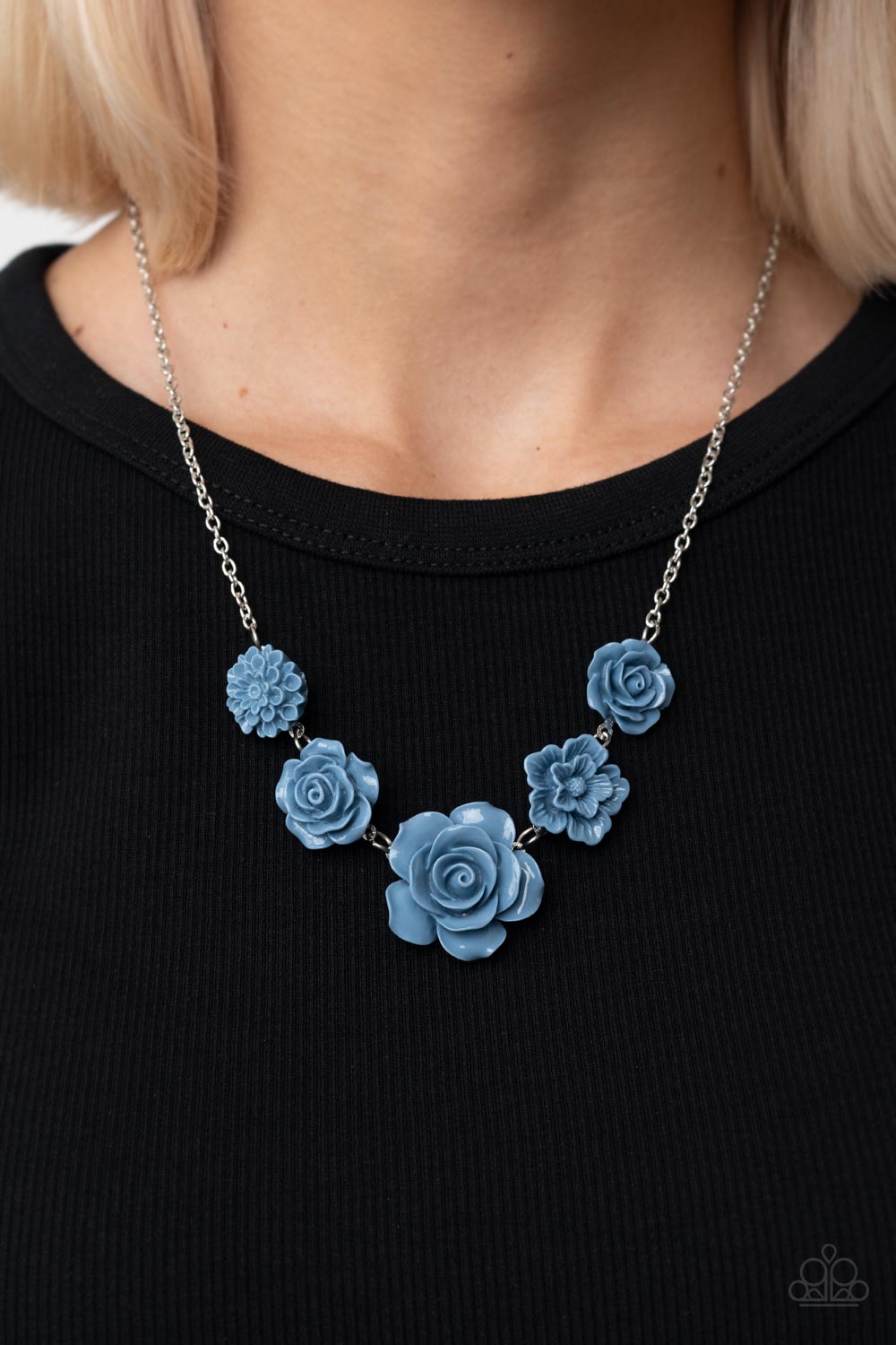 Paparazzi Accessories PRIMROSE and Pretty - Blue A dainty collection of primrose and floral Spring Lake frames delicately connect below the collar, blooming into a seasonal centerpiece. Features an adjustable clasp closure. Sold as one individual necklace