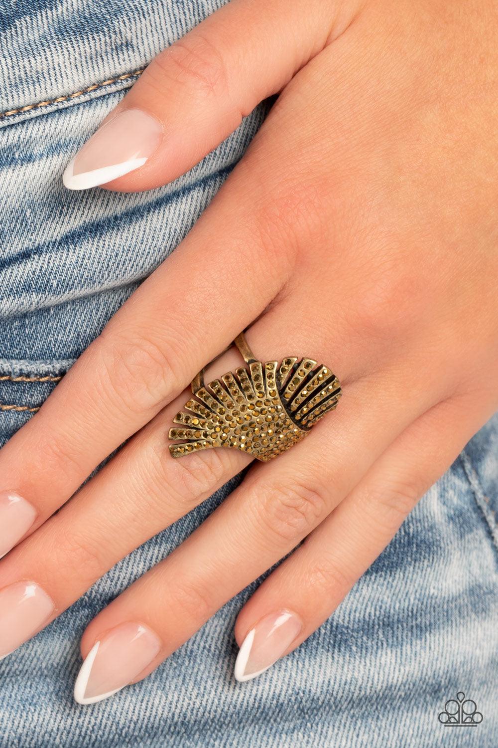 Paparazzi Accessories Express Your-SELFIE - Brass Dainty aurum rhinestones are sprinkled across pillared brass frames that asymmetrically overlap across the center of the finger, culminating into an expressive shimmer. Features a stretchy band for a flexi