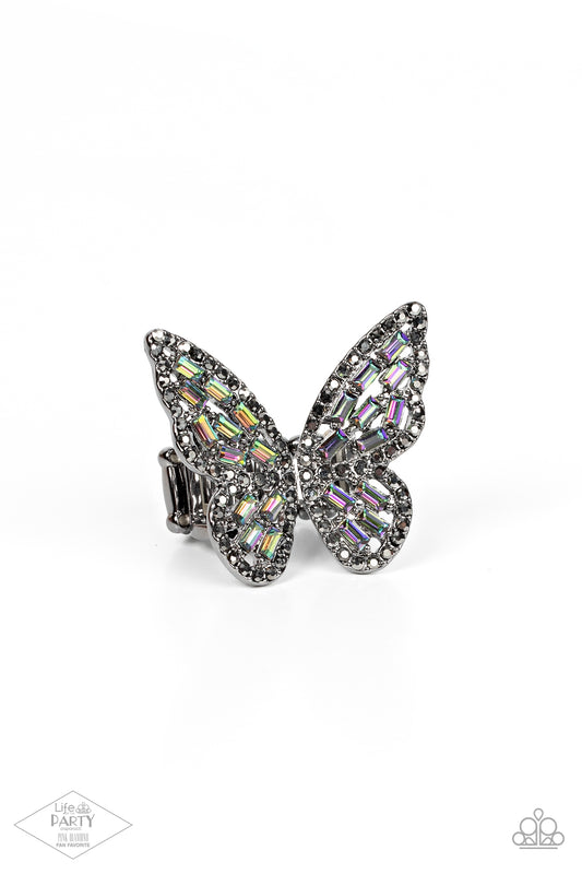 Paparazzi Accessories Flauntable Flutter - Multi Dainty oil spill emerald-cut rhinestones are sprinkled across the gunmetal wings of a butterfly that is encrusted in dauntless hematite rhinestones for a dramatically dazzling finish. Features a stretchy ba