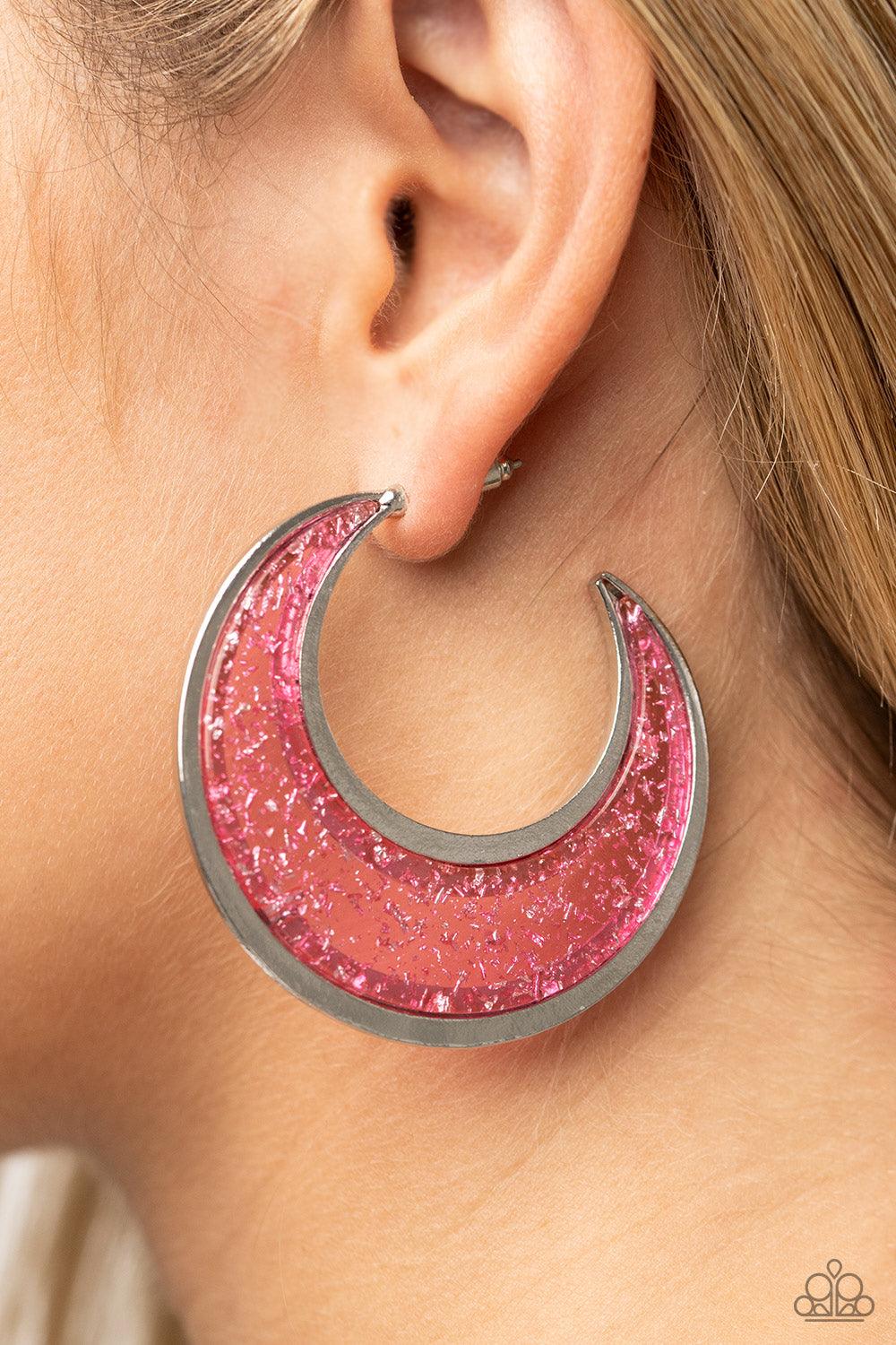 Paparazzi Accessories Charismatically Curvy - Pink Flecked in silver shavings, a glistening pink acrylic half moon frame is bordered with flat shiny bars that coalesce into a curvaceous hoop. Earring attaches to a standard post fitting. Hoop measures appr