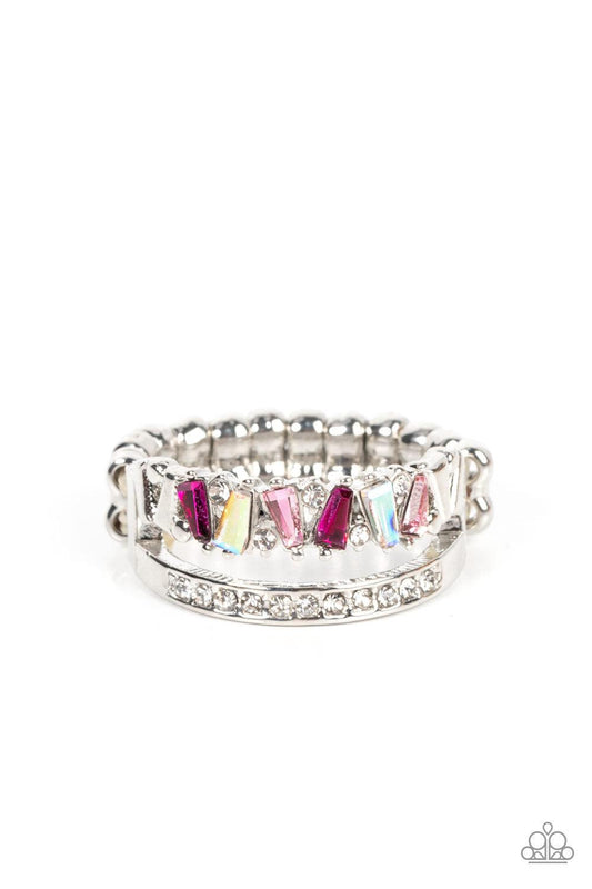 Paparazzi Accessories Fractal Fascination - Pink Infused with a timeless band of white rhinestones, a dainty collection of trapezoidal light pink, dark pink, and iridescent rhinestones staggers across the finger for a glamorously layered look. Features a