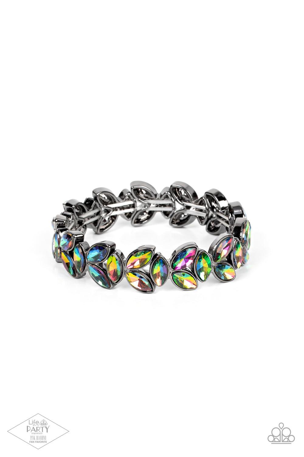 Paparazzi Accessories Gilded Gardens - Multi Featuring a stellar oil spill finish, trios of marquise cut rhinestones delicately join into leafy gunmetal frames along a stretchy band, creating a refined display around the wrist. Sold as one individual brac