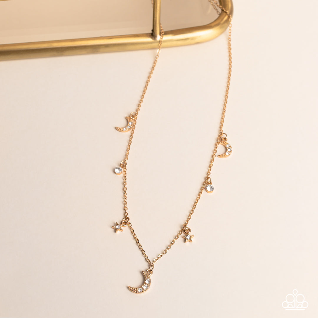 Paparazzi Accessories Lunar Lagoon - Gold Dotted with dainty white rhinestones, a cosmic collection of gold moon and star charms swings from a dainty gold chain below the collar. Solitaire white rhinestones sparkle in between the charms, adding additional