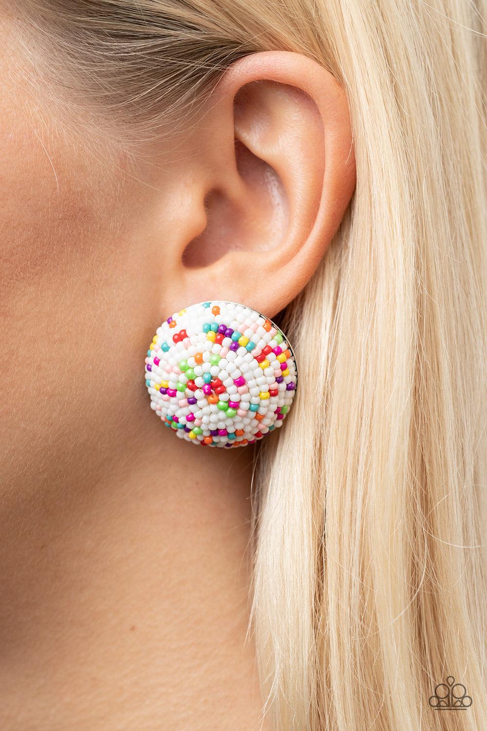 Paparazzi Accessories Kaleidoscope Sky - White A bubbly assortment of dainty multicolored beads spins around the front of an oversized and beveled silver frame, resulting in a boisterous pop of kaleidoscopic color. Earring attaches to a standard post fitt