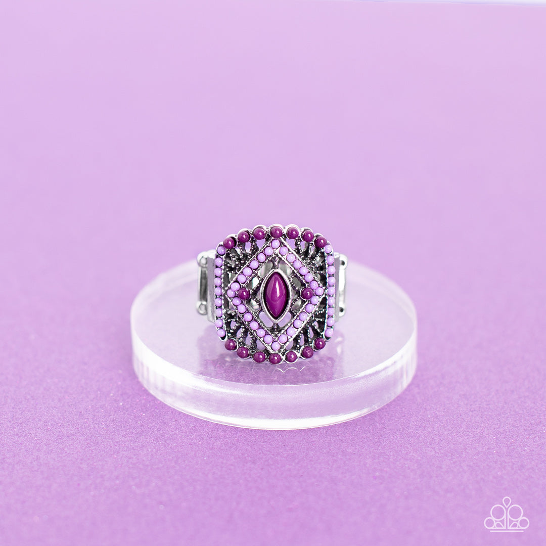 Paparazzi Accessories Amplified Aztec - Purple Dainty purple and plum beads adorn the front of an airy silver frame radiating with studded geometric texture, culminating into a colorful textile inspired pattern atop the finger. Features a stretchy band fo