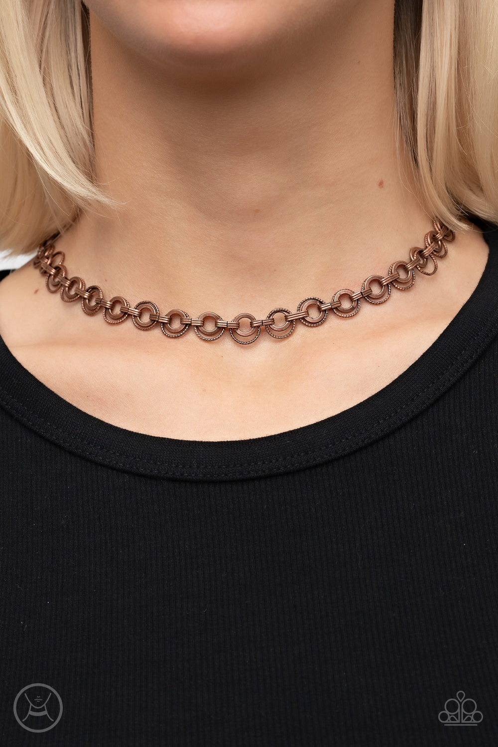 Paparazzi Accessories Grit and Grind - Copper Dainty pairs of textured copper hoops and rings link with pinched copper fittings around the neck, resulting in a gritty vibe. Features an adjustable clasp closure. Sold as one individual choker necklace. Incl