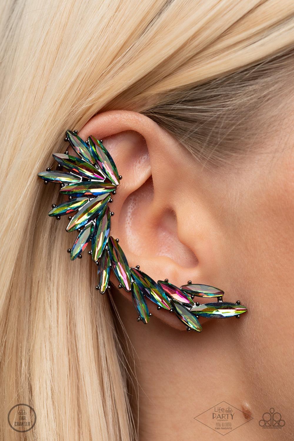 Paparazzi Accessories Because ICE Said So - Multi An explosion of marquise cut oil spill rhinestones delicately climb the ear, coalescing into a smoldering frame. Earring attaches to a standard post fitting. Features a clip-on fitting at the top for a sec