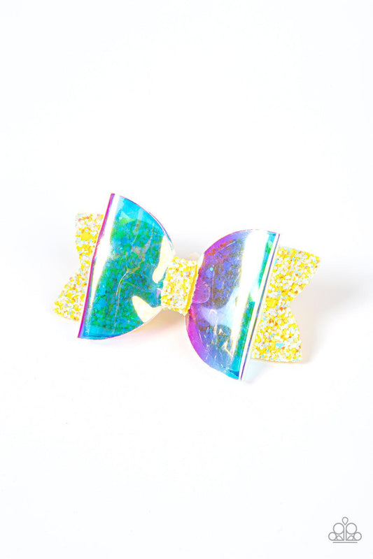 Paparazzi Accessories Futuristic Favorite - Yellow An iridescent plastic bow is layered over a glittery yellow fabric cutout creating a shimmering futuristic vibe. Features a standard hair clip on the back. Sold as one individual hair clip. Brooches & Lap