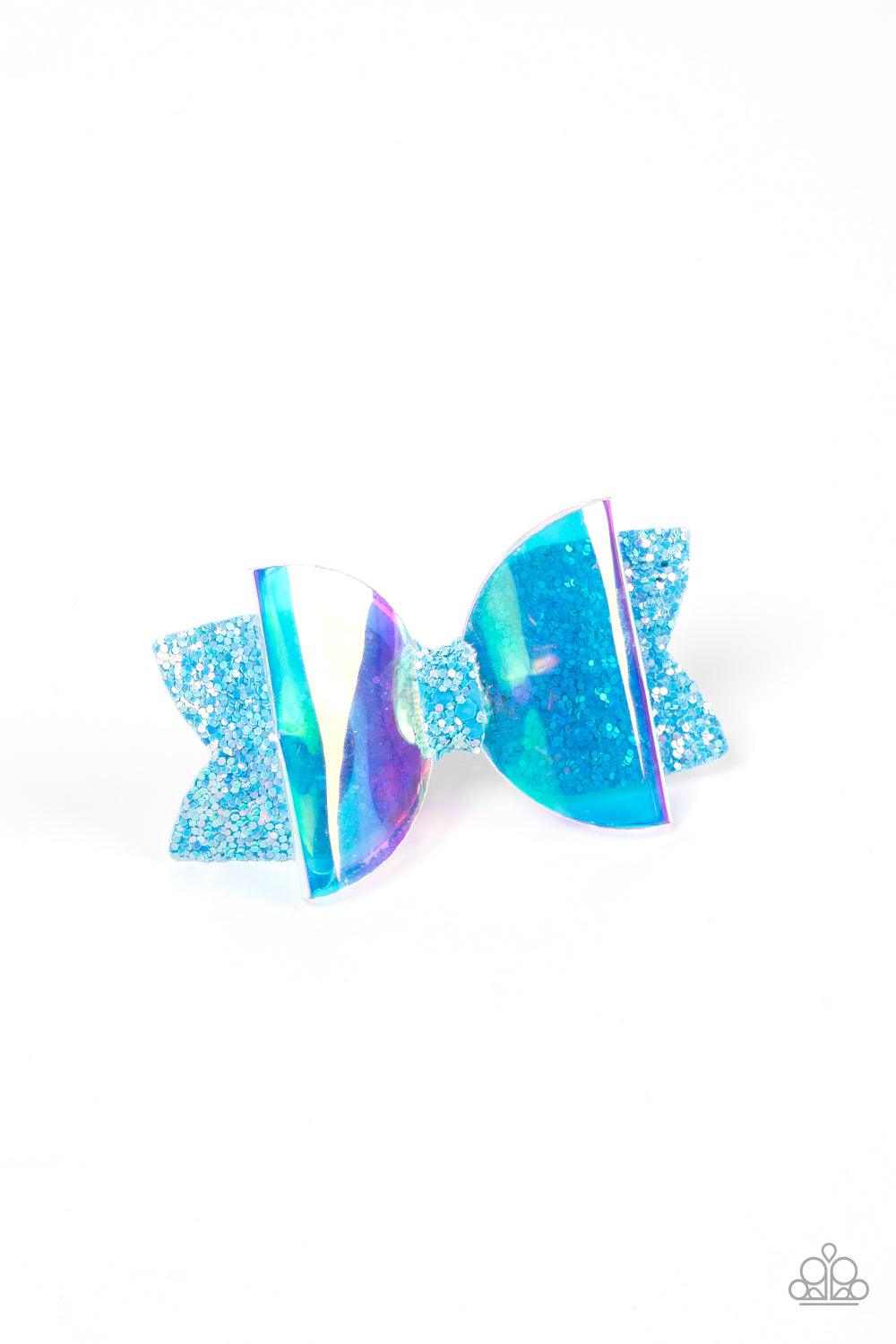 Paparazzi Accessories Futuristic Favorite - Blue An iridescent plastic bow is layered over a glittery blue fabric cutout creating a shimmering futuristic vibe. Features a standard hair clip on the back. Sold as one individual hair clip. Brooches & Lapel P