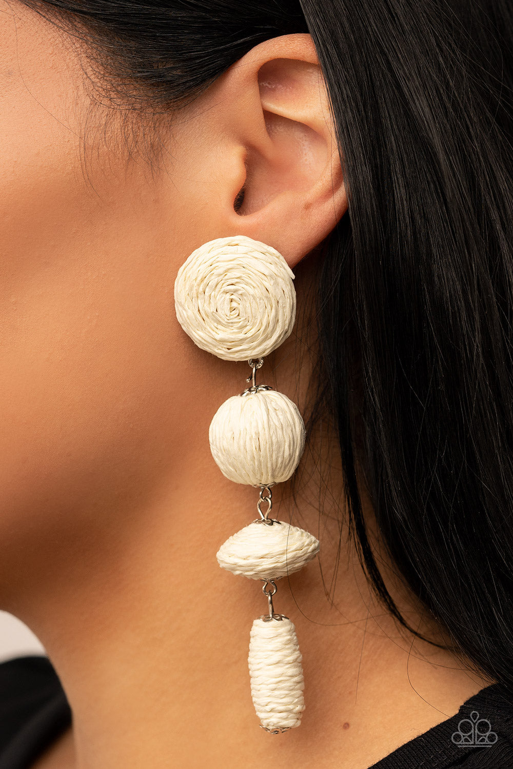 Paparazzi Accessories Twine Tango - White Strands of white crepe-like twine wraps around circle, sphere, oval, and oblong frames that delicately connect into a decorative tassel for a trendy homespun finish. Earring attaches to a standard post fitting. So