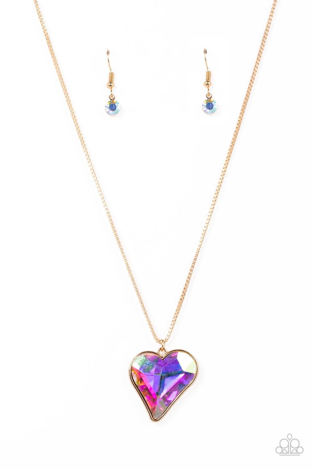 Paparazzi Accessories Lockdown My Heart - Gold An iridescent heart-shaped gem is pressed into a simple gold frame at the end of a gold box chain creating an adorable sentiment below the collar. Features an adjustable clasp closure. Sold as one individual