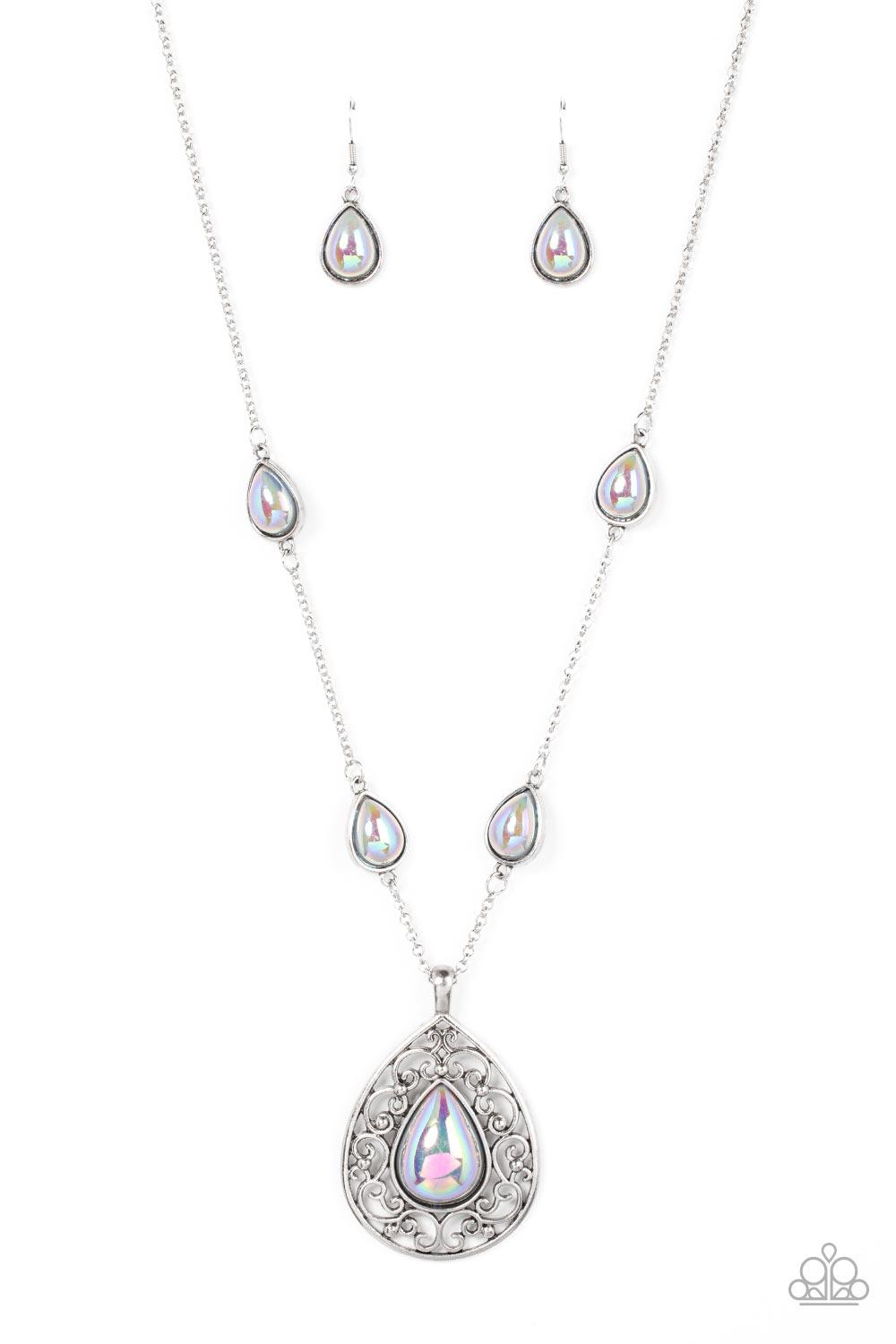 Paparazzi Accessories Magical Masquerade - Silver Brushed in an iridescent finish, a silvery teardrop bead is pressed into the center of an oversized silver teardrop frame that is bursting with vine-like filigree. Infused with matching teardrop beaded fra