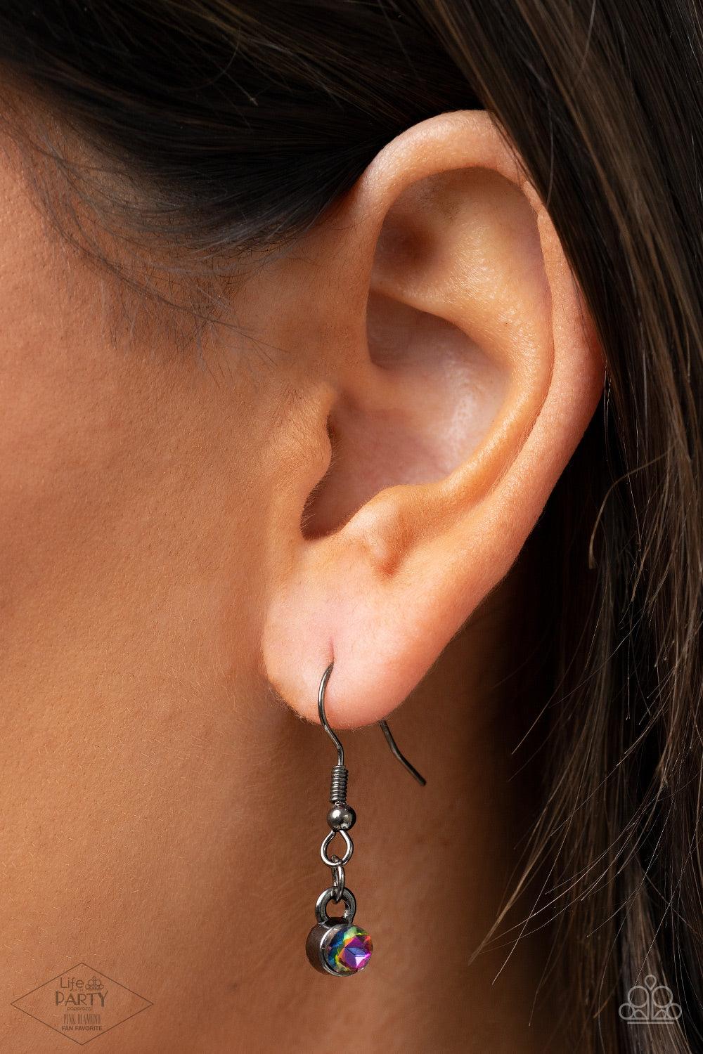 Paparazzi Accessories GLOW-Getter Glamour - Multi Crowned in a trio of dainty hematite rhinestones, an exaggerated display of oversized oil spill gems delicately link below the collar for a glamorous glow. Features an adjustable clasp closure. Sold as one