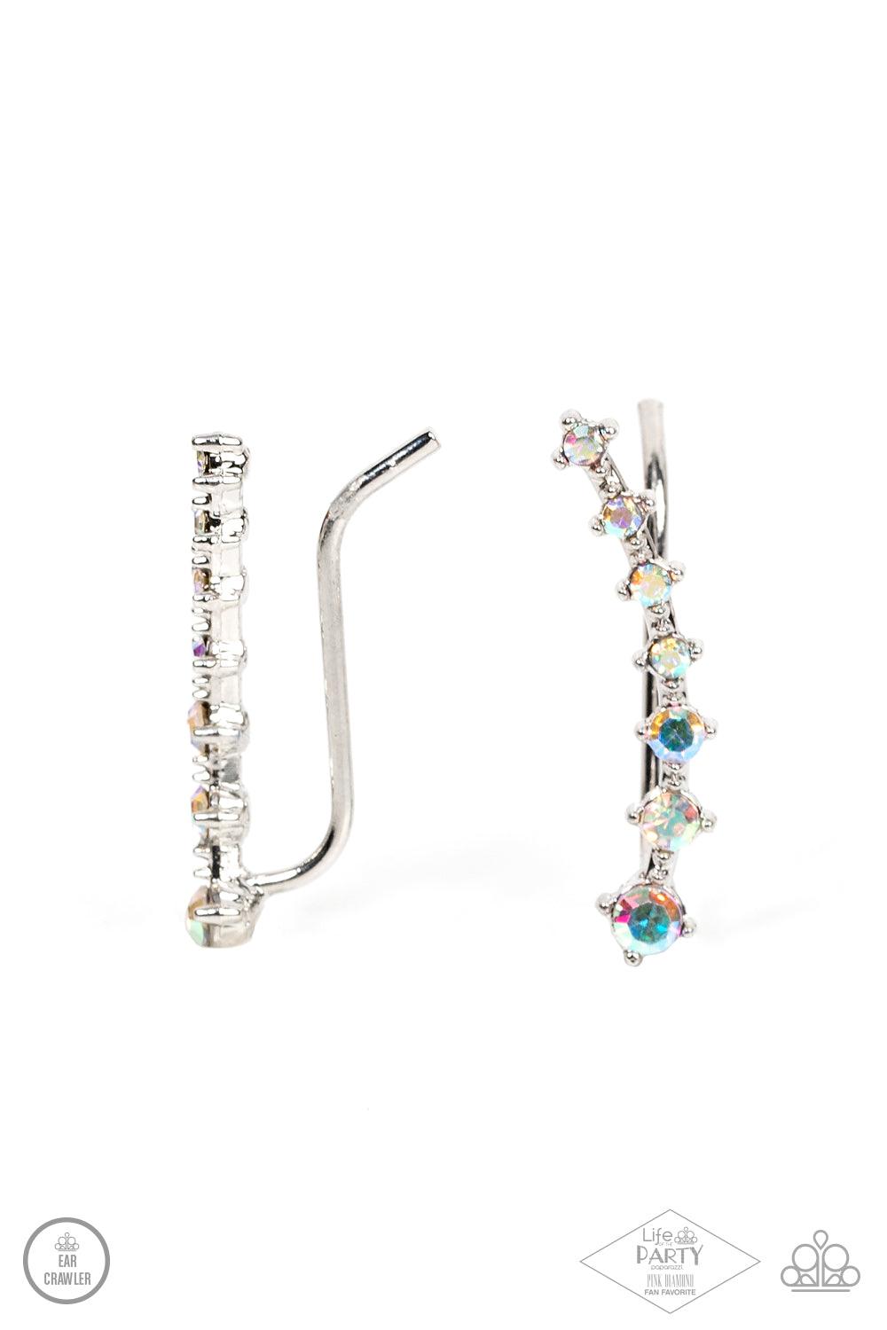 Paparazzi Accessories New Age Nebula - Multi Gradually decreasing in size, a dainty row of glittery iridescent rhinestones curve up the ear for a stellar chic look. Sold as one pair of ear crawlers. Earrings