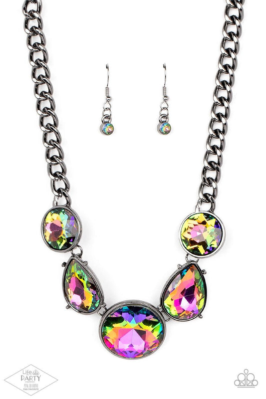 Paparazzi Accessories All The Worlds My Stage - Multi Infused with heavy gunmetal chain, an exaggerated display of round and teardrop-shaped oil spill rhinestones connects below the collar for a blinding look. Features an adjustable clasp closure. Sold as