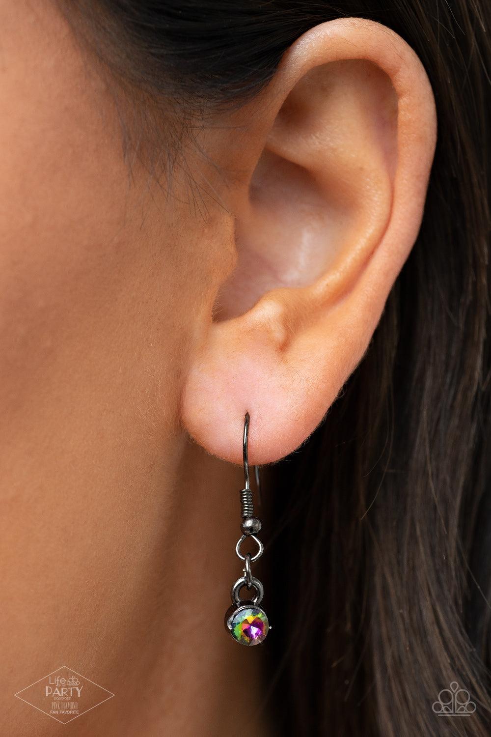 Paparazzi Accessories All The Worlds My Stage - Multi Infused with heavy gunmetal chain, an exaggerated display of round and teardrop-shaped oil spill rhinestones connects below the collar for a blinding look. Features an adjustable clasp closure. Sold as