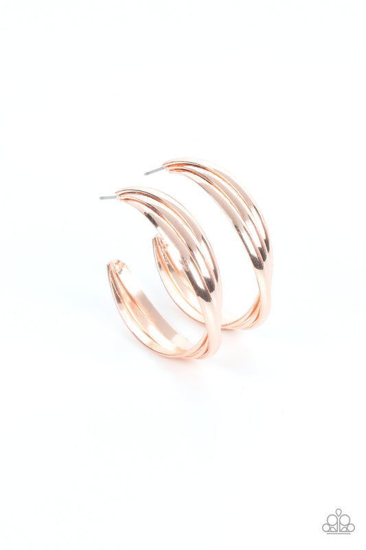 Paparazzi Accessories Curvy Charmer - Rose Gold Flat rose gold bars delicately twist and overlap into an oversized hoop, creating an edgy shimmer. Earring attaches to a standard post fitting. Hoop measures approximately 1 1/2" in diameter. Sold as one pai