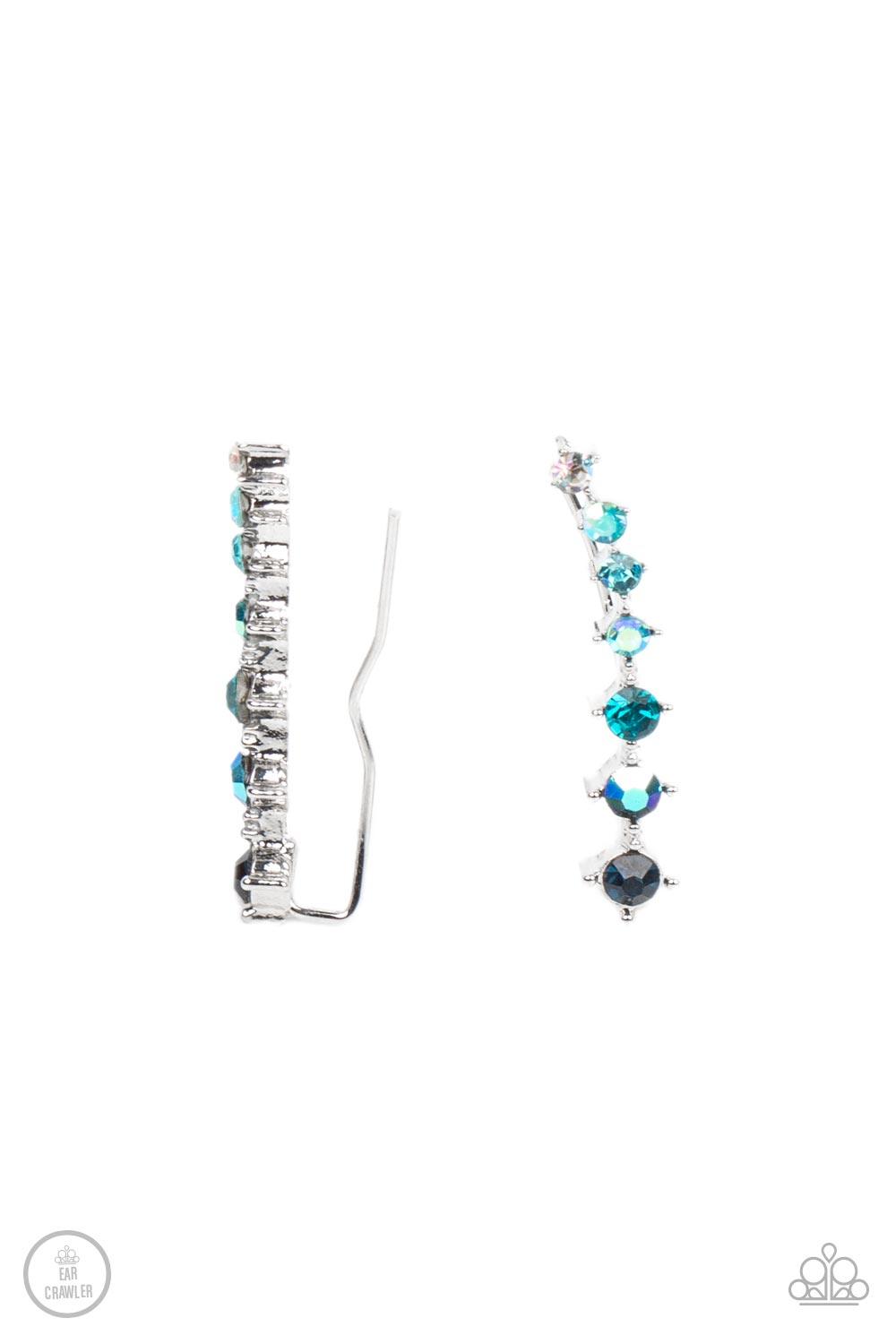 Paparazzi Accessories STARLIGHT Show - Blue An iridescent spectrum of dainty blue rhinestones gradually increase in intensity as they climb the ear for a stellar fashion. Features an extended post fitting that climbs the back of the ear and can be pressed
