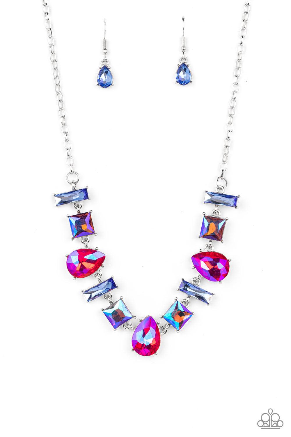 Paparazzi Accessories Interstellar Ice - Pink Featuring glassy, iridescent, and oil spill finishes, a mismatched collection of emerald cut blue, square multicolored, and teardrop pink gems delicately connects below the collar for a stellar statement. Feat