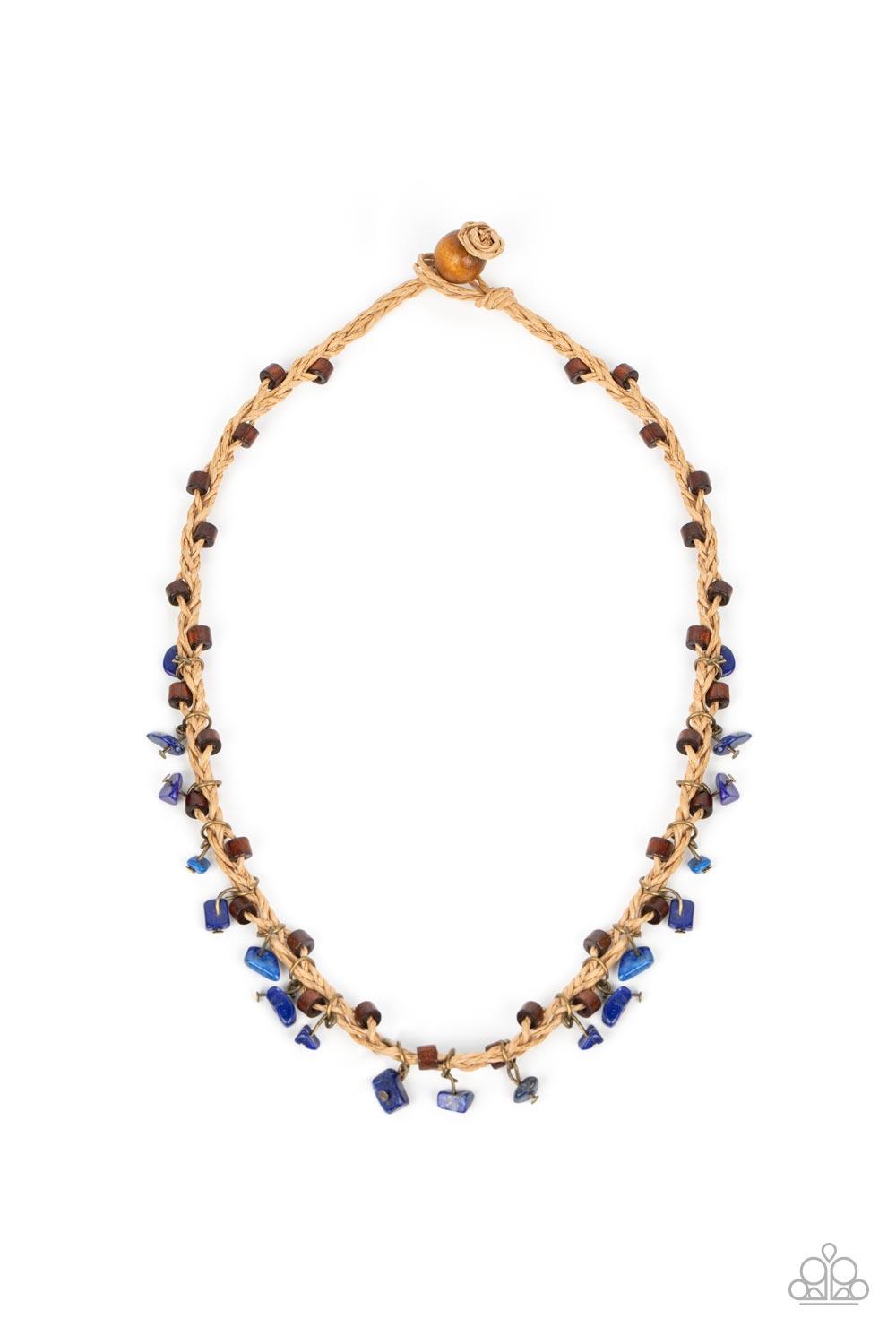 Paparazzi Accessories Canyon Voyage - Blue Infused with wooden accents, pieces of lapis lazuli swing from braided strands of crepe-like twine below the collar for a seasonal fringe. Features a button loop closure. Sold as one individual necklace. Necklace