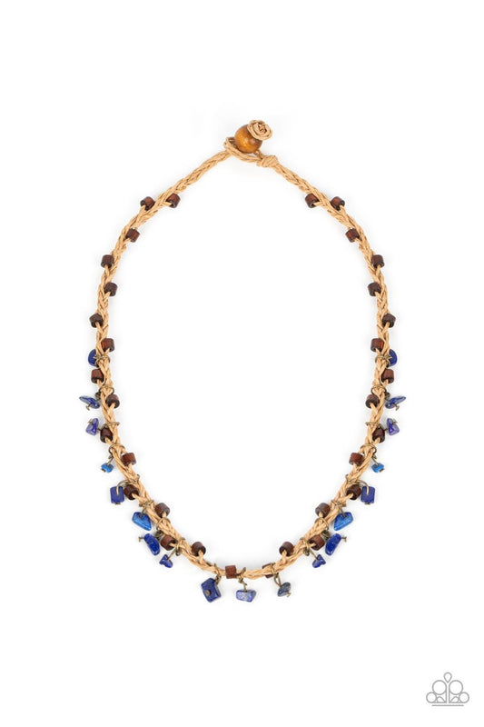 Paparazzi Accessories Canyon Voyage - Blue Infused with wooden accents, pieces of lapis lazuli swing from braided strands of crepe-like twine below the collar for a seasonal fringe. Features a button loop closure. Sold as one individual necklace. Necklace