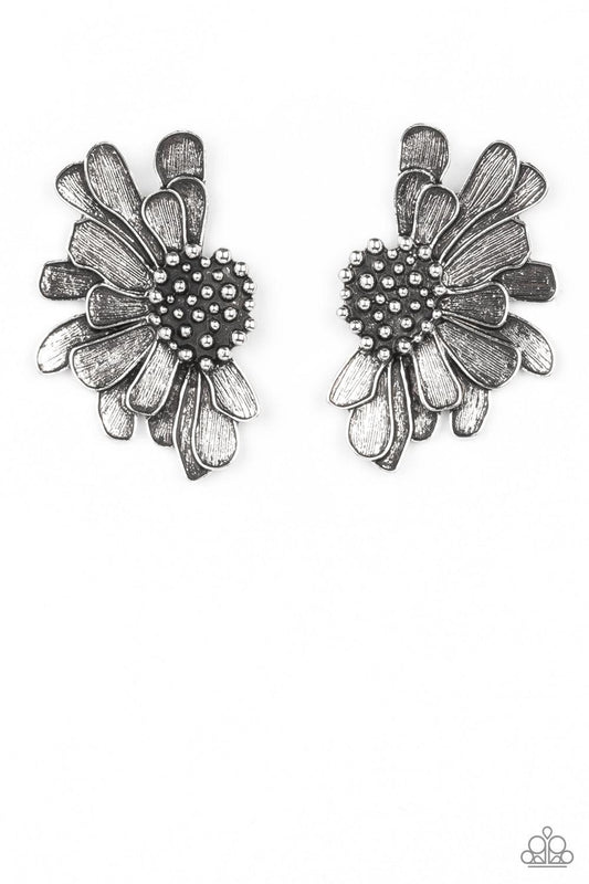 Paparazzi Accessories Farmstead Meadow - Silver Imperfect silver petals bloom from a studded center, layering into a rustic half blossom for a whimsical flair. Earring attaches to a standard post fitting. Sold as one pair of post earrings. Earrings