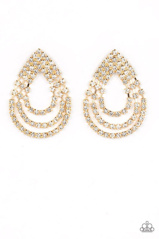 Paparazzi Accessories Take a POWER Stance - Gold Loops of glassy white rhinestones ripple out from the bottom of a stationary triangular fitting that is dotted in glittery white rhinestones, resulting in a timeless teardrop chandelier. Earring attaches to