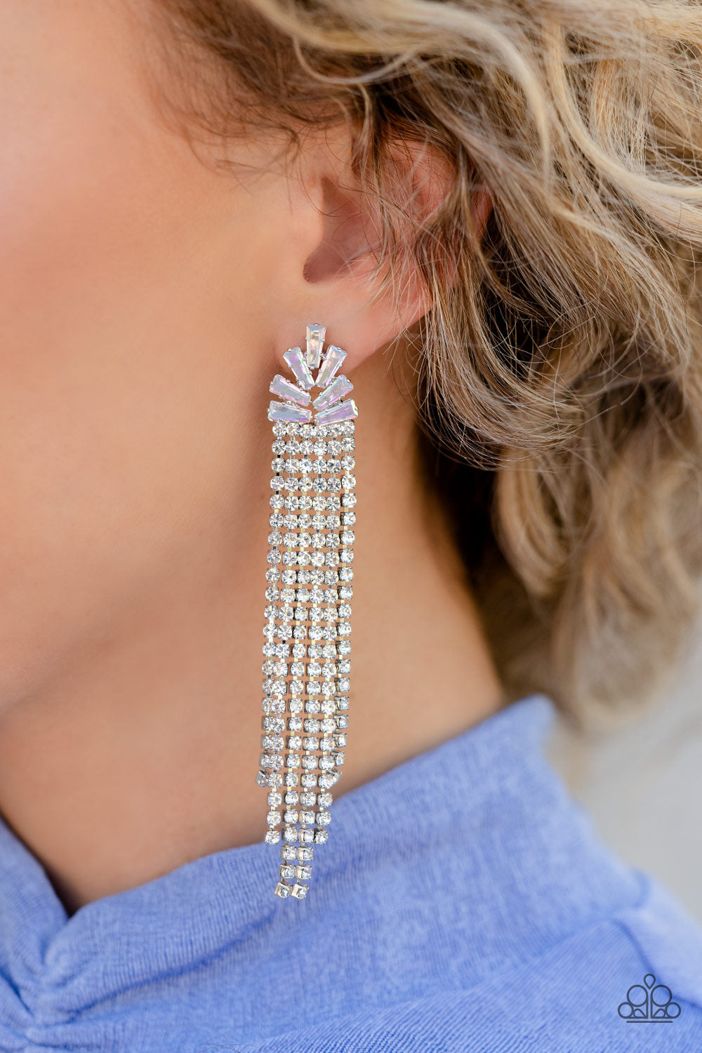 Paparazzi Accessories Overnight Sensation - Multi Sparkly strands of dainty white rhinestones stream out from the bottom of a silver frame made up of a staggered collection of iridescent and trapezoidal cut rhinestones, resulting in a timeless tassel. Ear